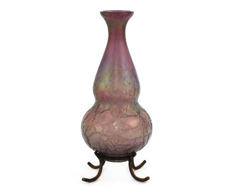 A Kralik glass vase,early 20th century, with a crackled amethyst iridescent ground, raised on an iron stand,32cm high (2)Cond