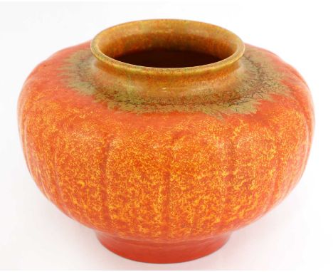 A Pilkington's Royal Lancastrian vase,of squat from with a mottled orange glaze, stamped marks and numbered '2834', 16cm high