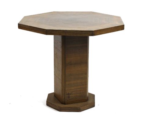 An Art Deco walnut octagonal lamp table,57cm diameter49cm highCondition report: Colour faded, chips to veneer on the edges. N