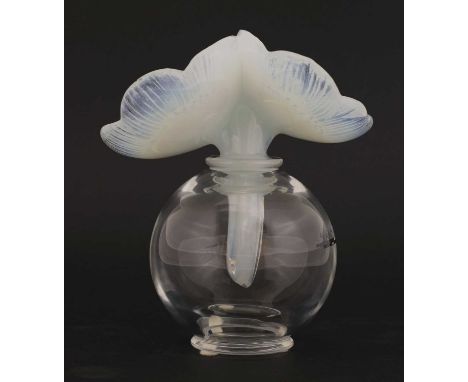 Two Lalique glass dressing table items,modern, a clear flacon, the stopper moulded as two anemone flowers,16cm high, and an a