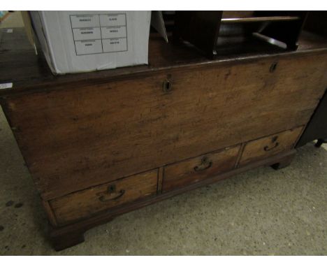 LATE 18TH CENTURY PINE LIFT UP TOP TRUNK WITH THREE DRAWERS TO BASE RAISED ON BRACKET FEET    