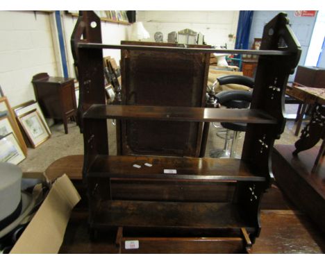 EDWARDIAN MAHOGANY WALL MOUNTED SPICE RACK WITH PIERCED SIDES WITH FOUR SHELVES    