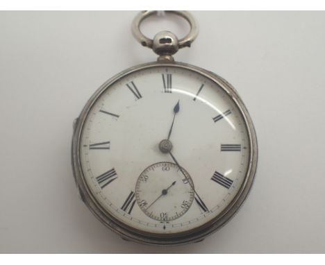 Hallmarked silver open face key wind pocket watch with subsidiary seconds dial CONDITION REPORT: This item is working at lott