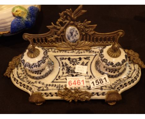 Brass and delftware inkwells