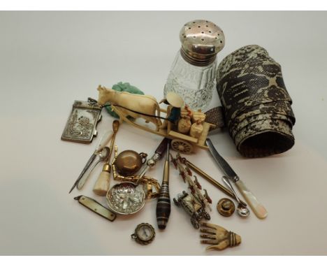 Assorted collectables to include a carved jade pendant sovereign case silver top sugar caster assay Chester
