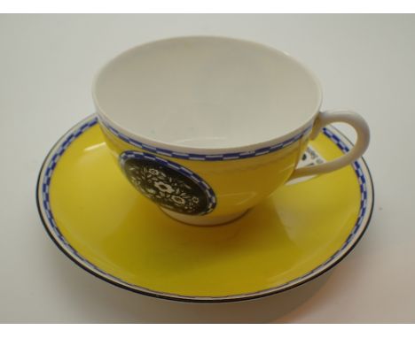 Royal Worcester yellow cup and saucer set