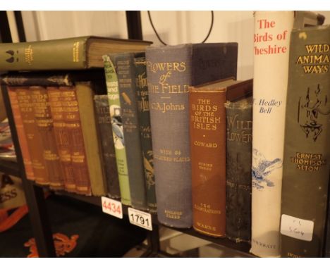 Shelf of mixed vintage wildlife books