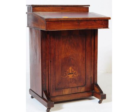 An early 20th century Edwardian mahogany davenport bureau desk. The desk of davenport form, having a red leather skiver to to