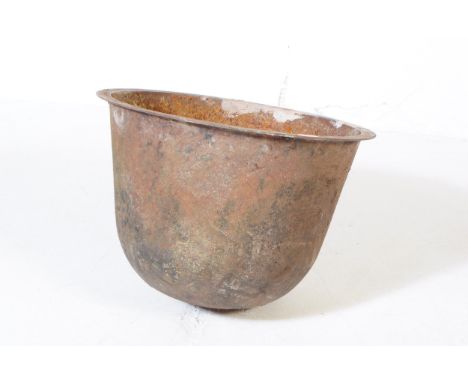 A 19th century Victorian cast iron boiler planter copper. Of circular form with tapering body on circular base. Measures appr
