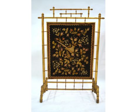 A Regency faux bamboo fire/draught screen, mounted with an embroidered textile panel