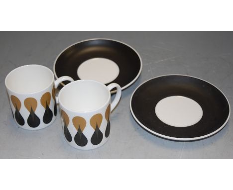 A boxed Wedgwood Susie Cooper design and Diablo pattern six coffee cups and saucers; together with six matching tea plates, a