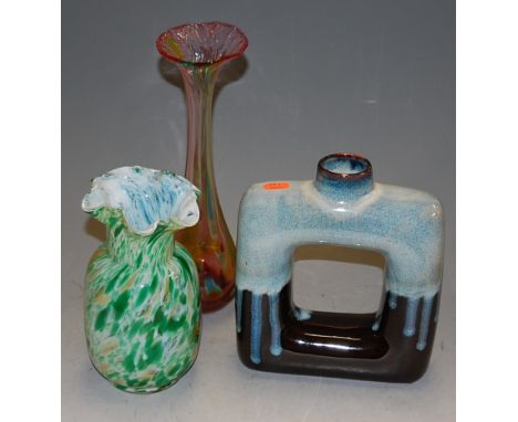 A contemporary blown and coloured glass vase, h.32cm; one other smaller exmaple; and a ceramic ring vase (3)