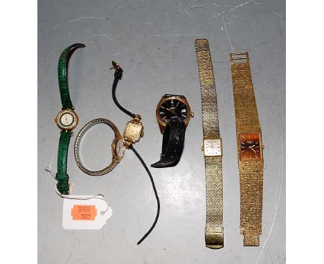 A ladies gilt metal cased and steel backed Rotary wrist watch having enamel dial, baton markers and quartz movement on textur