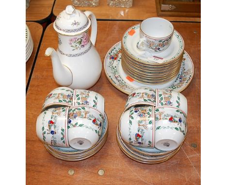 A Royal Worcester Christmas pattern part tea set; together with one other non-matching Worcester coffee pot