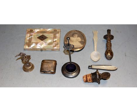 A small collection of mixed effects, to include silver vesta case, silver oval photograph frame, mother of pearl calling card