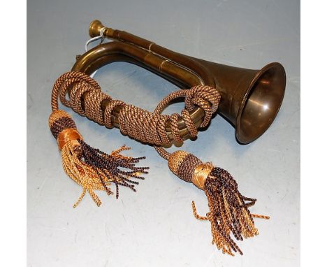 A brass bugle, apparently unmarked, 26.5cm