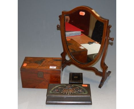 A Victorian mahogany framed skeleton dressing table mirror; an ebony veneered small trinket box; marquetry tea caddy; and a C