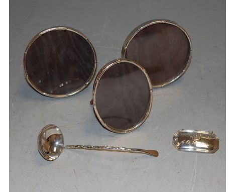 A silver decanter collar, engraved Aberdeen International Football Festival; three silver plated easel photograph frames; and