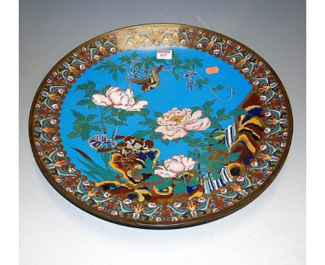 An early 20th century Japanese cloisonné enamel wall charger, decorated with birds and flowers, dia.46cm