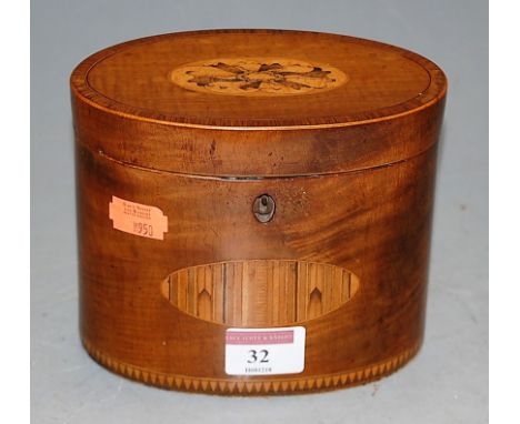 A George III mahogany and specimen marquetry inlaid tea caddy, of oval form, h.12cmIvory escutcheon missing.Hinge loose and w