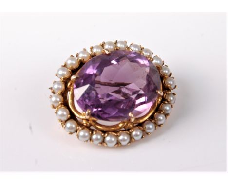 A 9ct amethyst and split cultured pearl brooch, the oval faceted amethyst, claw mounted with a surround of split cultured pea