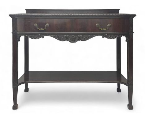 Late 19th century mahogany bow-fronted sideboard or serving table, the shaped top with gadroon carved edge and raised back ga