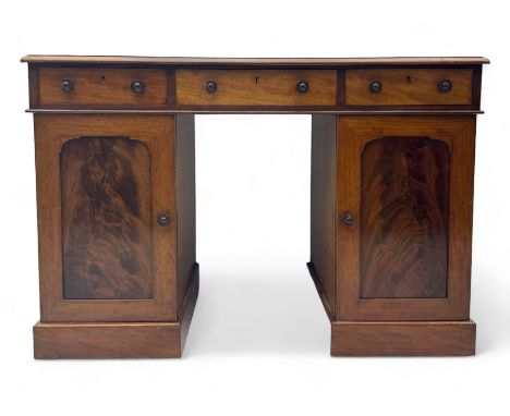 Victorian mahogany kneehole desk, rectangular top with moulded edge, over central frieze drawers flanked by two additional dr