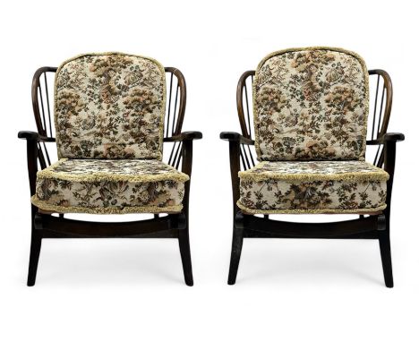 Joynson Holland - pair of mid-20th century stained beech framed easy chairs, shaped back and flat armrests over floral tapest