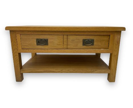 Contemporary light oak coffee table, rectangular top with rounded edges, fitted with two drawers, on square supports united b