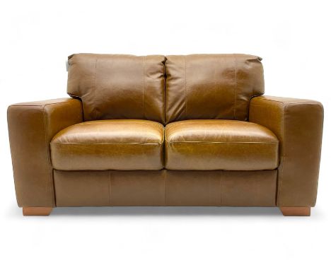 Contemporary two-seat sofa, upholstered in brown leather with flat arms, fixed seat cushions and backrests, on wooden block f