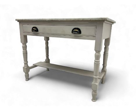Edwardian painted pine washstand, rectangular marble top over frieze drawer, on turned supports united by stretcher shelfDime