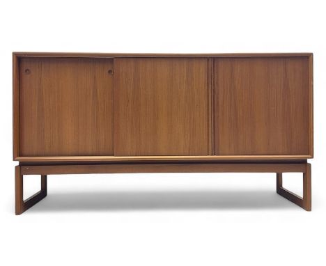 Mid-20th century teak sideboard, rectangular top over three sliding doors, the left side with three adjustable baize-lined sh