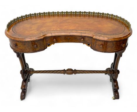 Victorian walnut kidney-shaped writing desk, moulded top with floral cast brass gallery and inset leather writing surface, fi