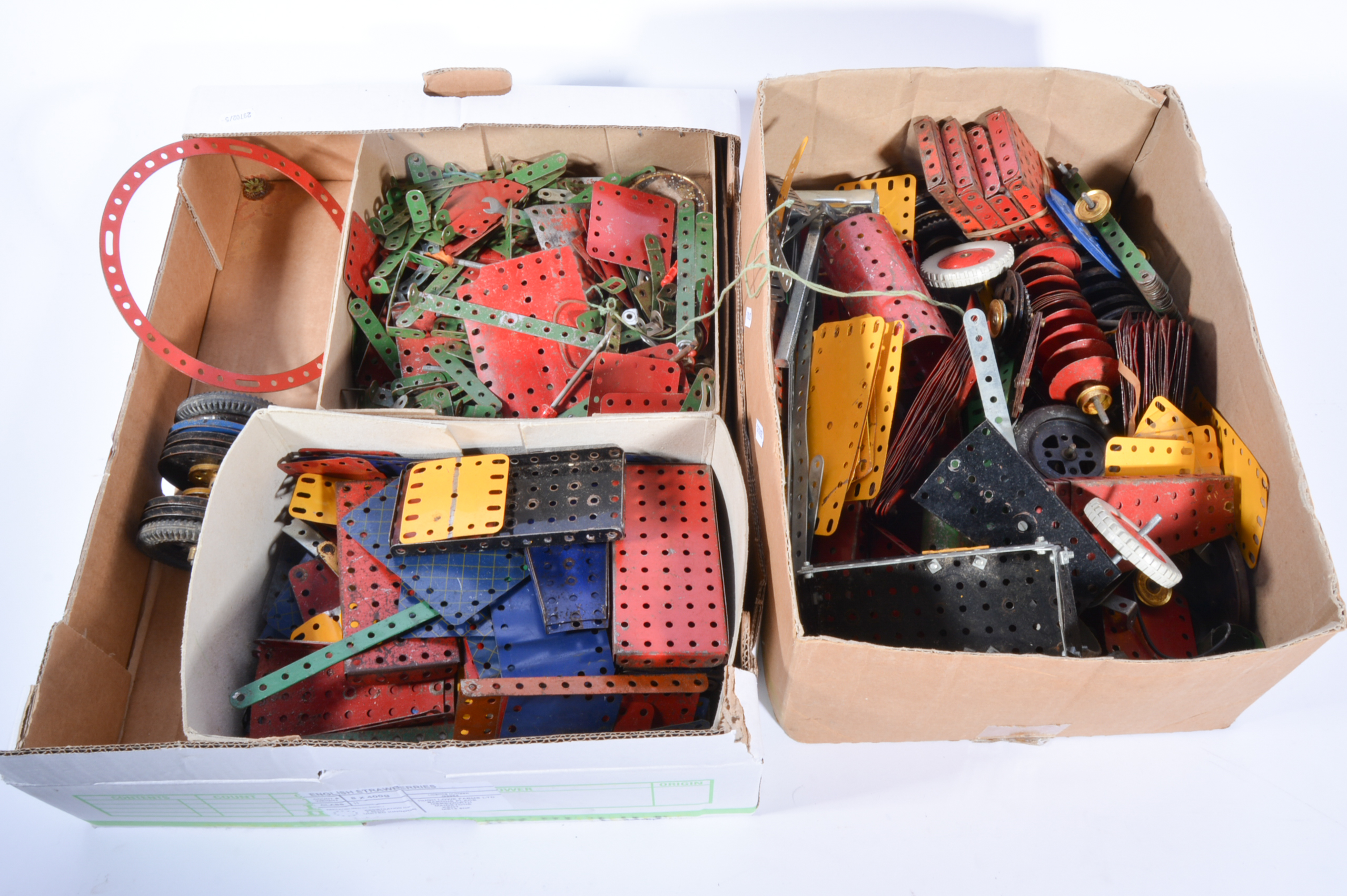 Meccano, two boxes of used parts pieces and strips.