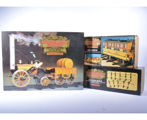 Hornby live steam engine, Stephensons Rocket Locomotive set with wagon and track sets, all boxed. 