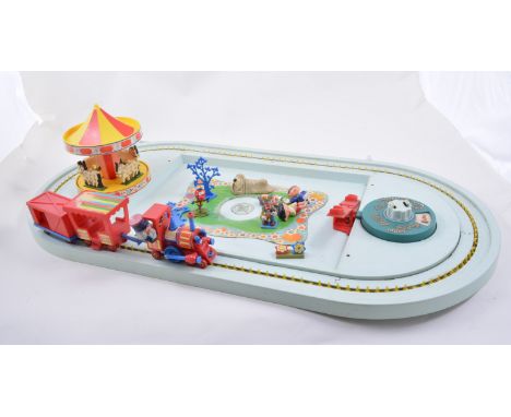 Corgi Toys The Magic Roundabout train set with selection of figures, no box, along with a Deans plush toy of a monkey, (2).