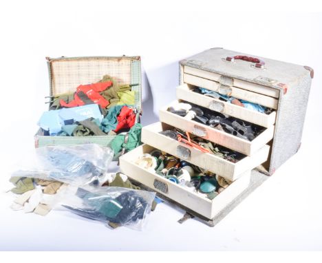 Large quantity of early Action Man accessories, clothing and parts, housed in a box with pull out draws and suitcase, includi