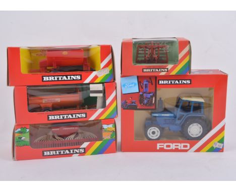 Britains farm toy models, 9523 Ford Tractor 7710, 9543 Push-off Buck Rake, 9537 Vicon Towed Vari-Spreader, 9544 Accord Seed D