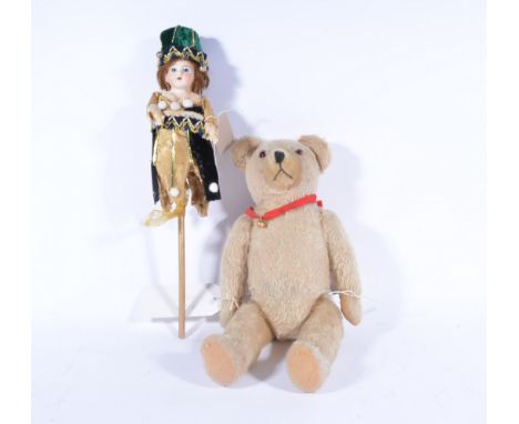 Vintage plush and jointed teddy bear 42cm, along with a bisque head puppet on stick 25cm, (2). 