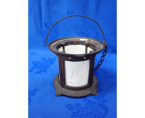 A VICTORIAN IRON HANGING LITHOPHANE LAMP set with five panels of domestic and childhood scenes