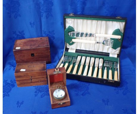 A GEORGIAN TEA CADDY together with a moneybox, a boxed ball clock and a canteen of cutlery