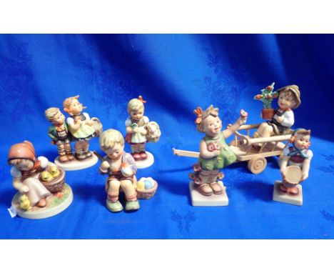 A COLLECTION OF GOEBEL FIGURES with market themes