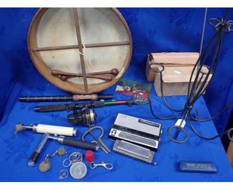 A COLLECTION OF MUSICAL INSTRUMENTS including an Irish Bodhran, Jew's harp, mouth organs, plus a hanging metal six-light lamp