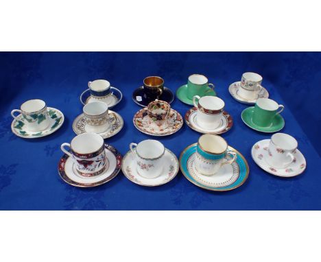 A COLLECTION OF COFFEE CANS AND SAUCERS including Royal Crown Derby, Aynsley, Worcester and other similar 