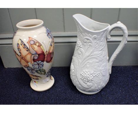 A MODERN MOORCROFT VASE with butterfly design, with a Portmeirion Victorian style moulded jug