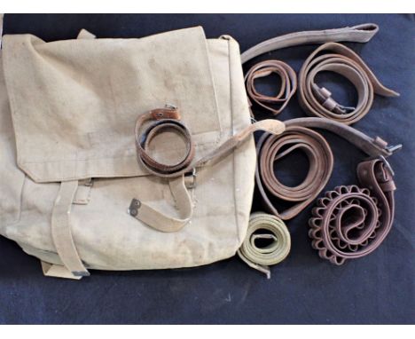 A WWII ARMY FIELD PACK with leather straps included