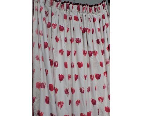 A PAIR OF ANDREW MARTIN TULIP PRINT CURTAINS check lined with velvet trim, interlined, approx 205cm long by 160cm wide. (in n
