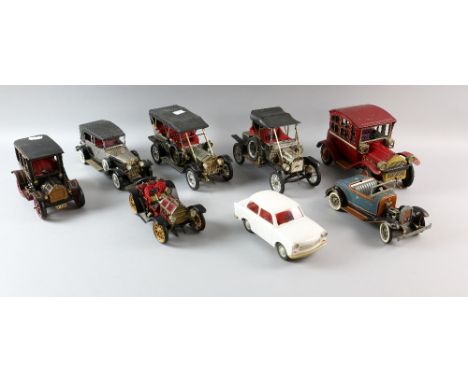 8 tinplate and plastic models of vintage cars to include Schuco tin plate clockwork 1913 Mercer car, No.1225.and anker Clockw
