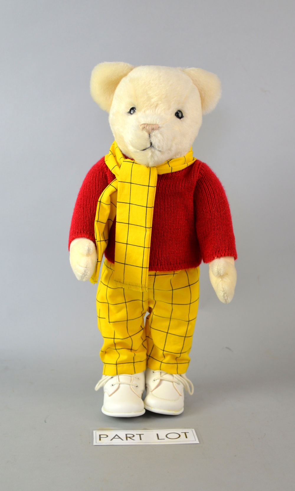 A late 20th century Merrythought Rupert Bear doll in original box