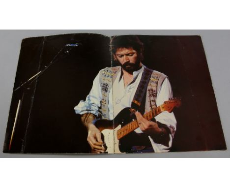 Eric Clapton - Vintage brochure signed to the inside to light area by Eric Clapton, all pages present.Provenance: The vendor 